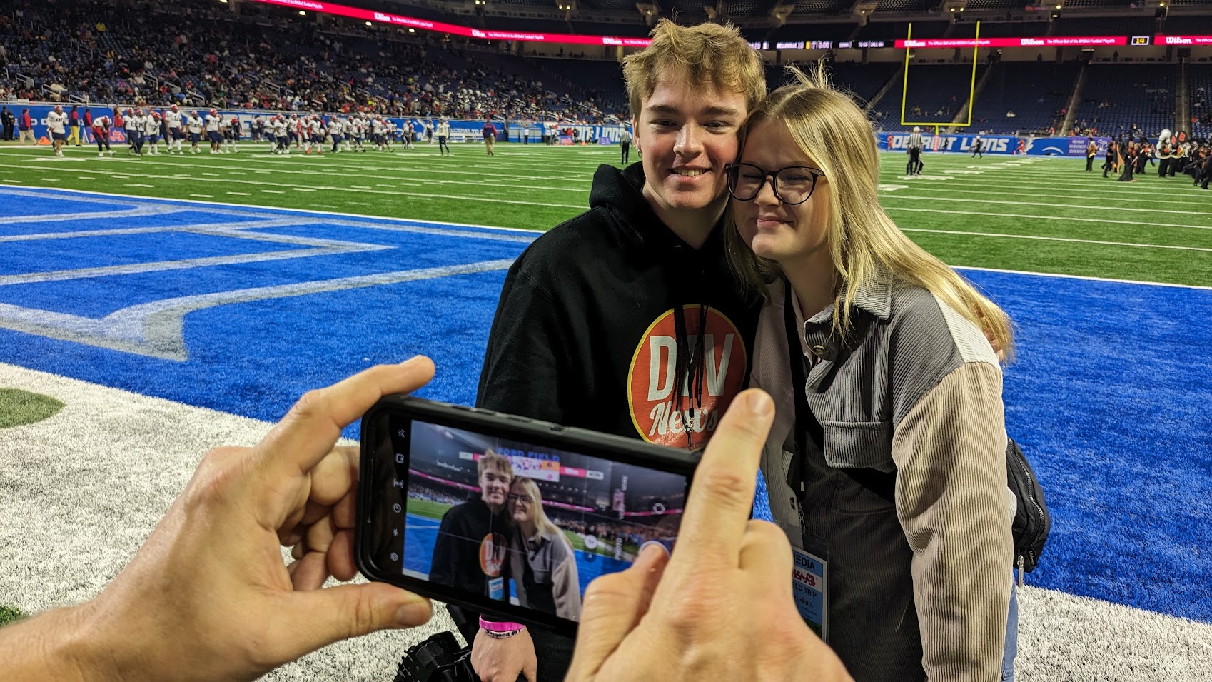 Brooke and Kalob pause for a picture at Ford Field