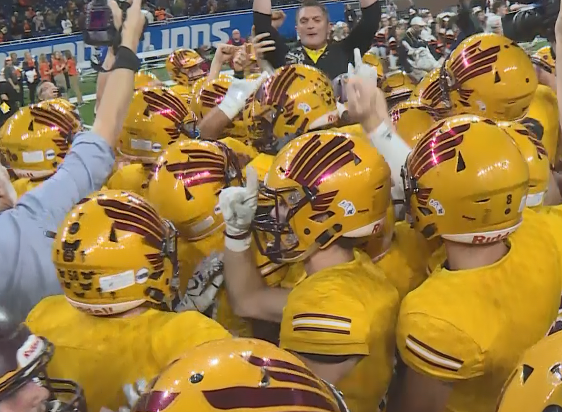 A couple Davison Varsity Football State Champs visited ABC 12